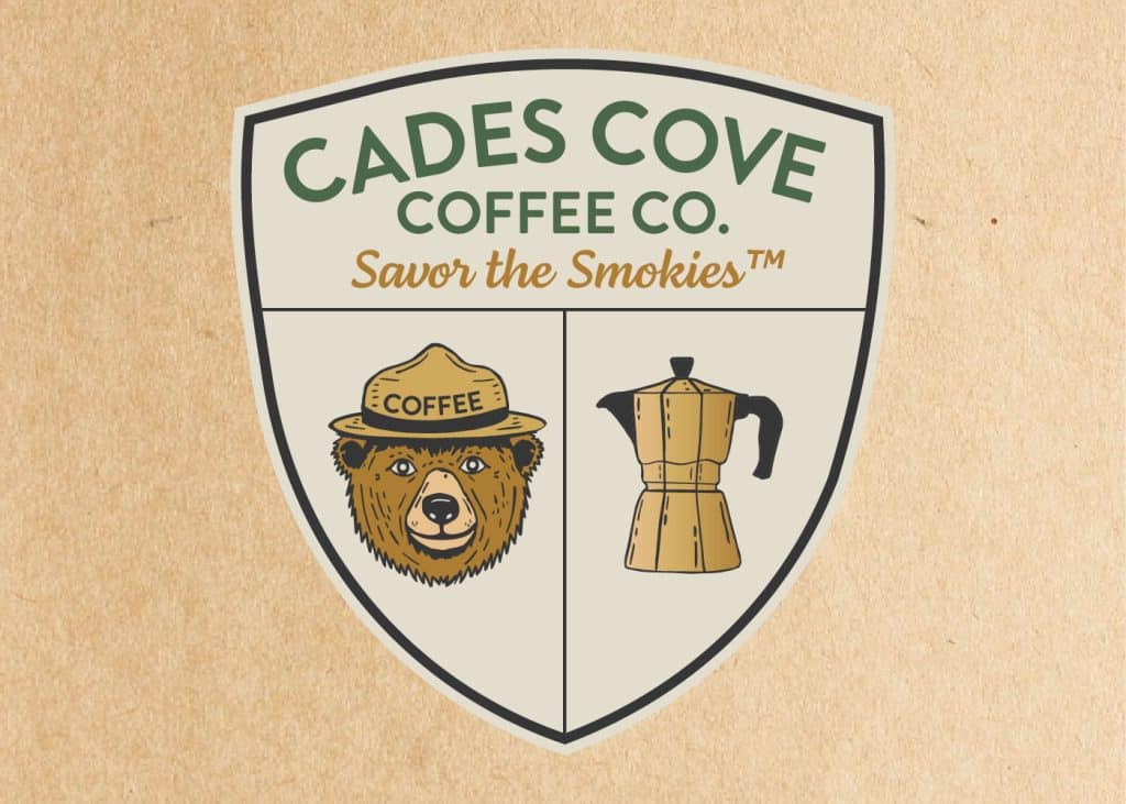 Cades Cove Coffee Co. shield logo mockup with bear and moka pot on kraft paper background