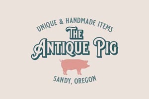 The Antique Pig logo mockup with vintage pig illustration, Sandy Oregon