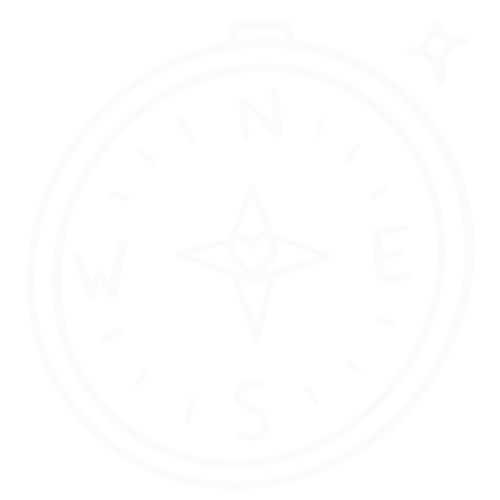 Hand-drawn compass with a heart at the center of the needle
